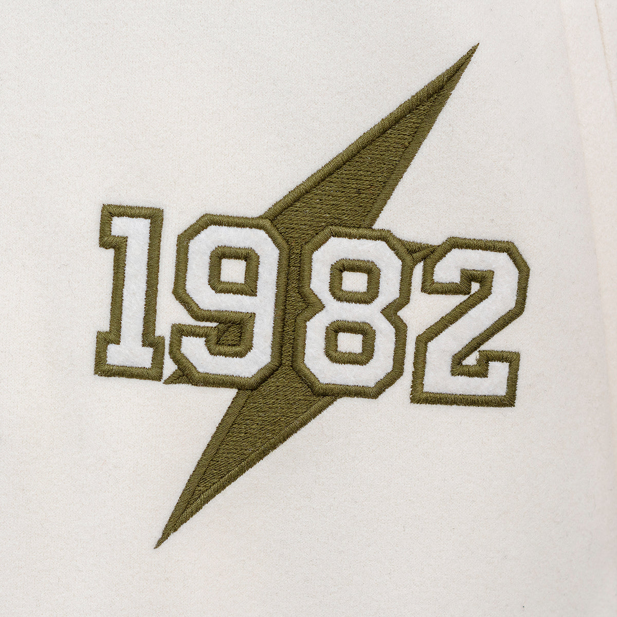 Kvetinová vysokoškolská bunda béžová